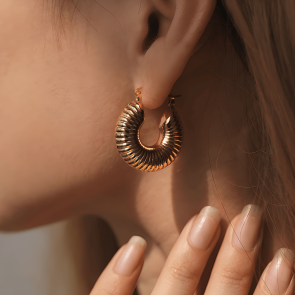 Gold snail textured hoops earrings